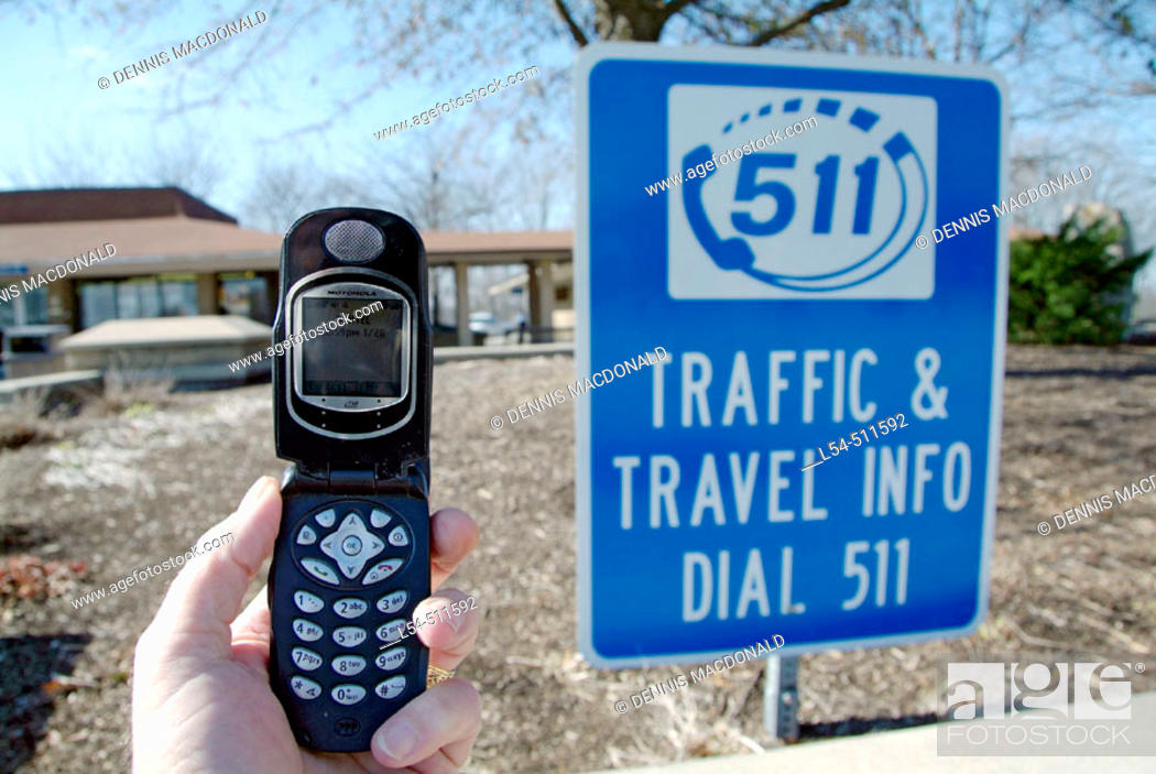 Stock Photo: Sign posted at a Kentucky Rest Comfort station showing a traffic and travel telephone number.