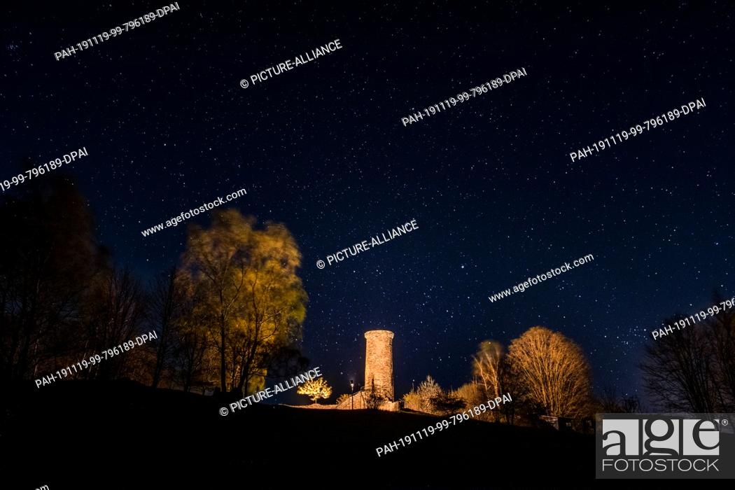 Stock Photo: 22 April 2019, Saxony, Annaberg-Buchholz: Castle ruin Schreckenberg at night Photo: Nico Schimmelpfennig/dpa-Zentralbild/ZB.