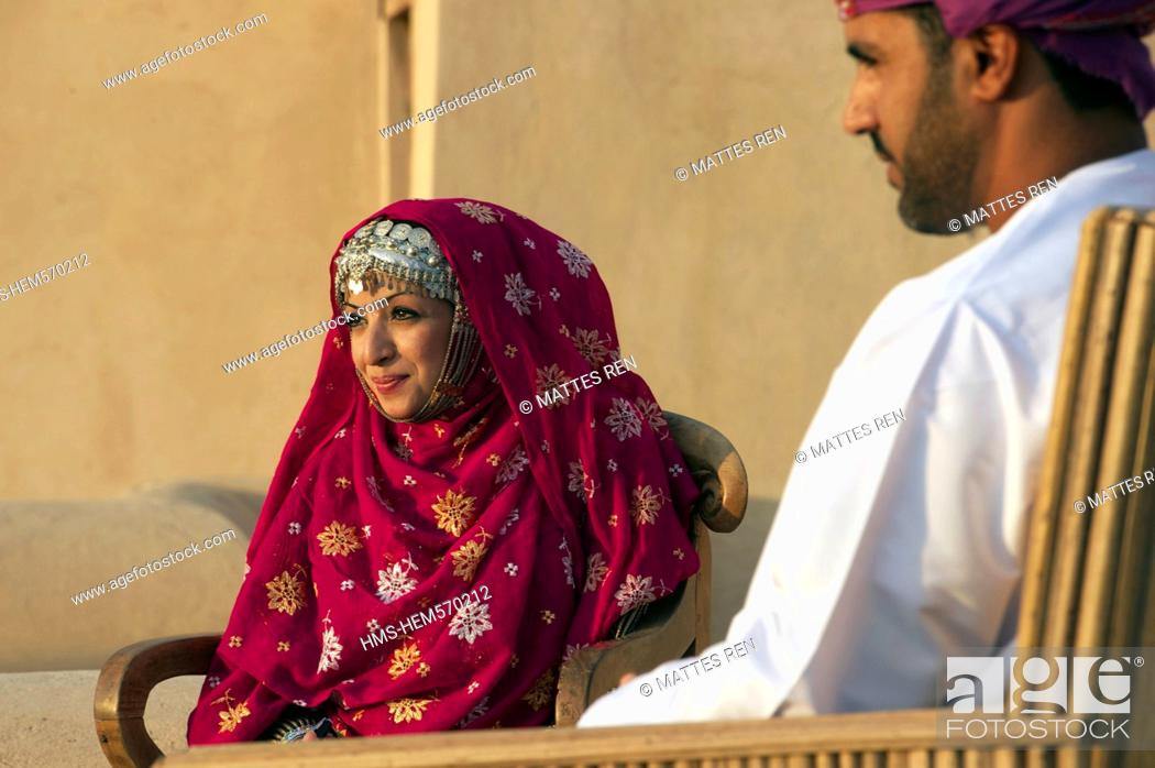 Stock Photo: Sultanate of Oman, Al Dakhiliyah Region, Western Hajar Mountains, Nizwa, the fort, portrait of an Omani couple wearing traditional outfit.