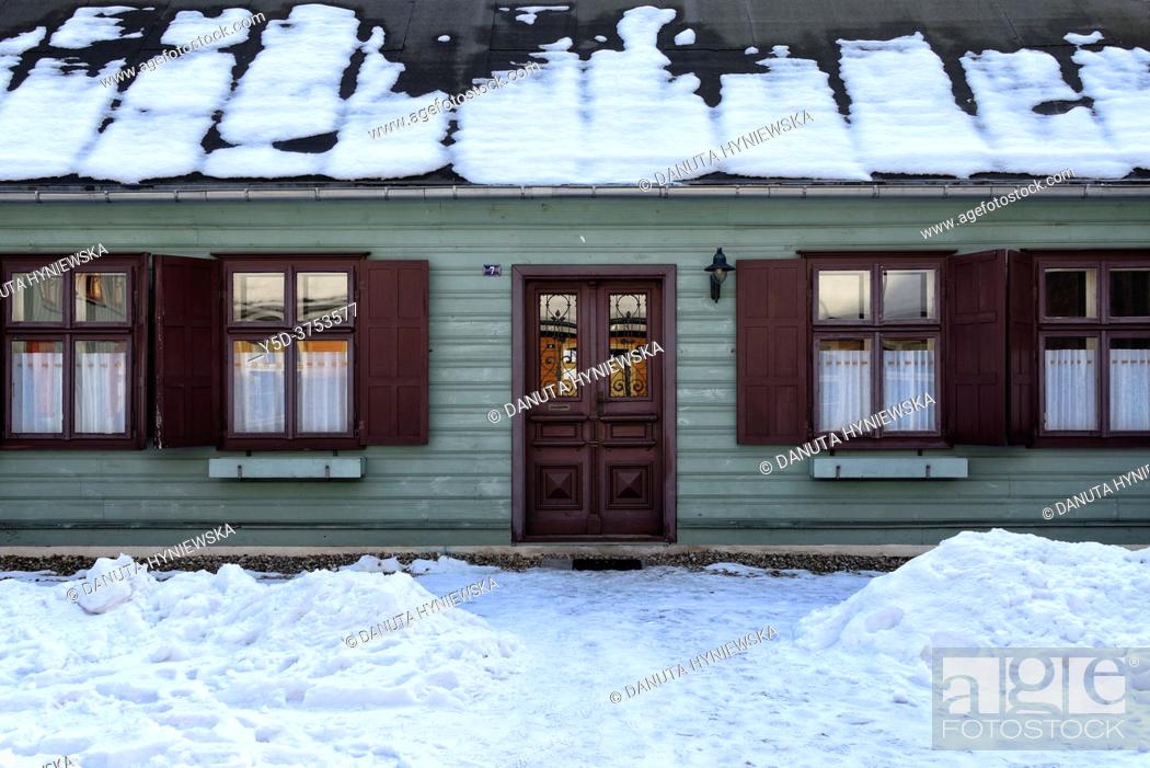 Stock Photo: Winter scene, Open-air Museum of regional Wooden Architecture - integral part of Central Museum of Textiles, located near main artery of Lodz - Piotrkowska.