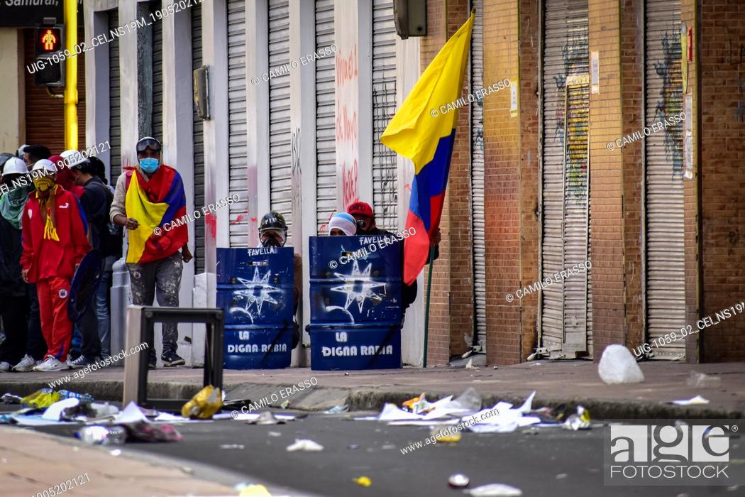Stock Photo: Clashes between demostrators and police riot in Pasto, Narino on May 19, 2021 during an antigovernment protest against police brutality and the health reform of.