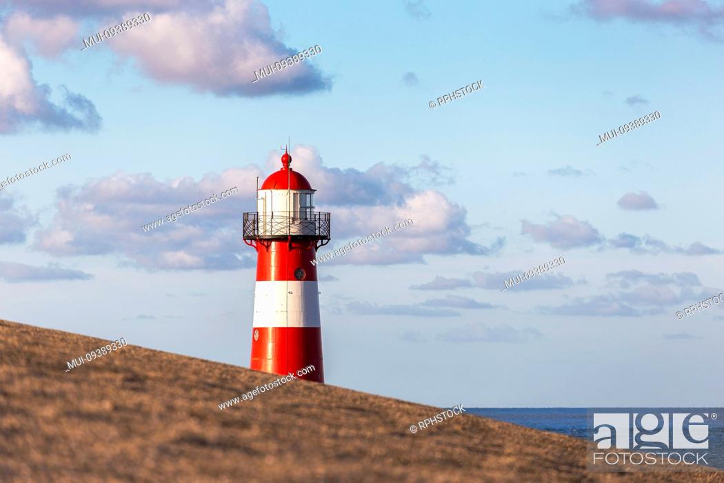 Stock Photo: The lighthouse Noorderhooft, also known as Westkapelle Laag is one of the most known Lighthouses in the Netherlands, It was built in 1875.