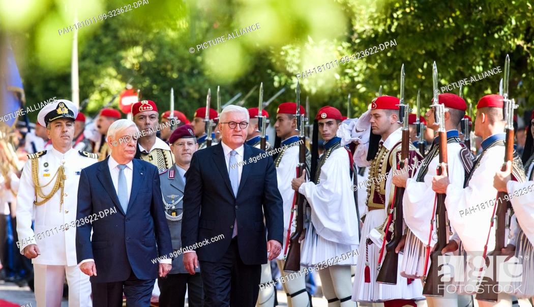 Stock Photo: 11 October 2018, Greece, Athens: President Frank-Walter Steinmeier (r) is greeted with military honours by Prokopis Pavlopoulos, President of Greece.
