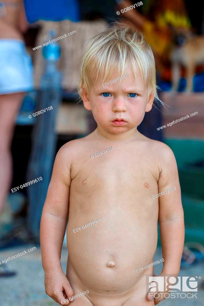 Baby with blond hair and blue eyes on the beach, Stock Photo, Picture And  Low Budget Royalty Free Image. Pic. ESY-048999610 | agefotostock