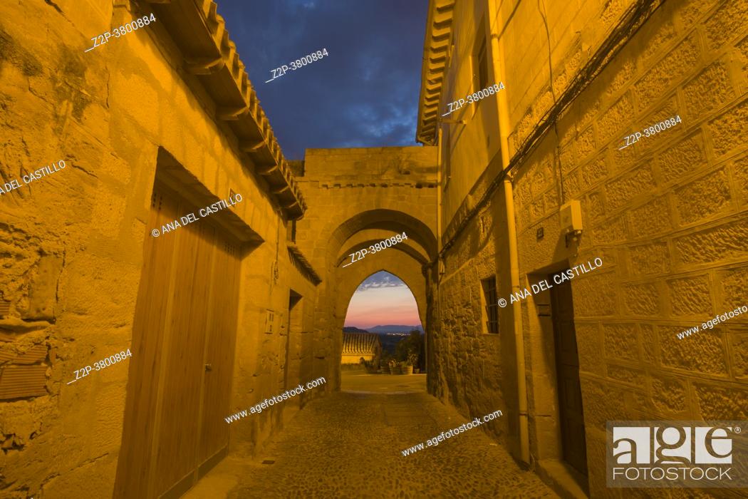 Stock Photo: Briones La Rioja Spain on July, 20, 2020: Cityscape by sunset Briones is one of the Most Beautiful Villages in Spain. Old gate in the wall.