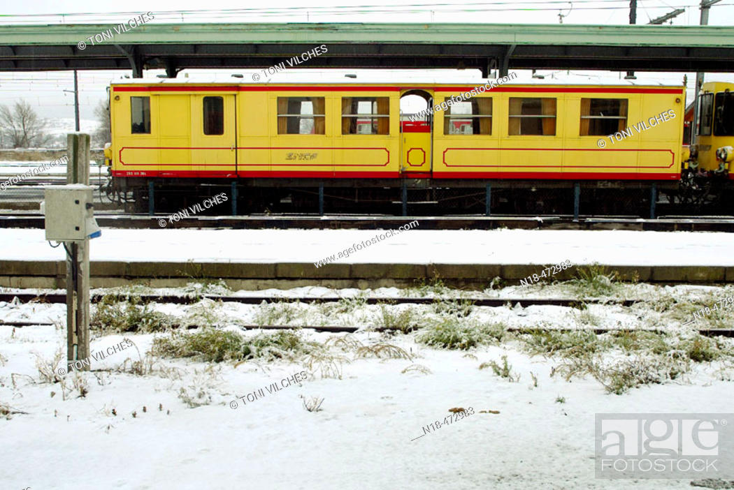 Stock Photo: Yellow train (Le train jaune) in international station of La Tour de Carol. Languedoc-Rousillon. France.