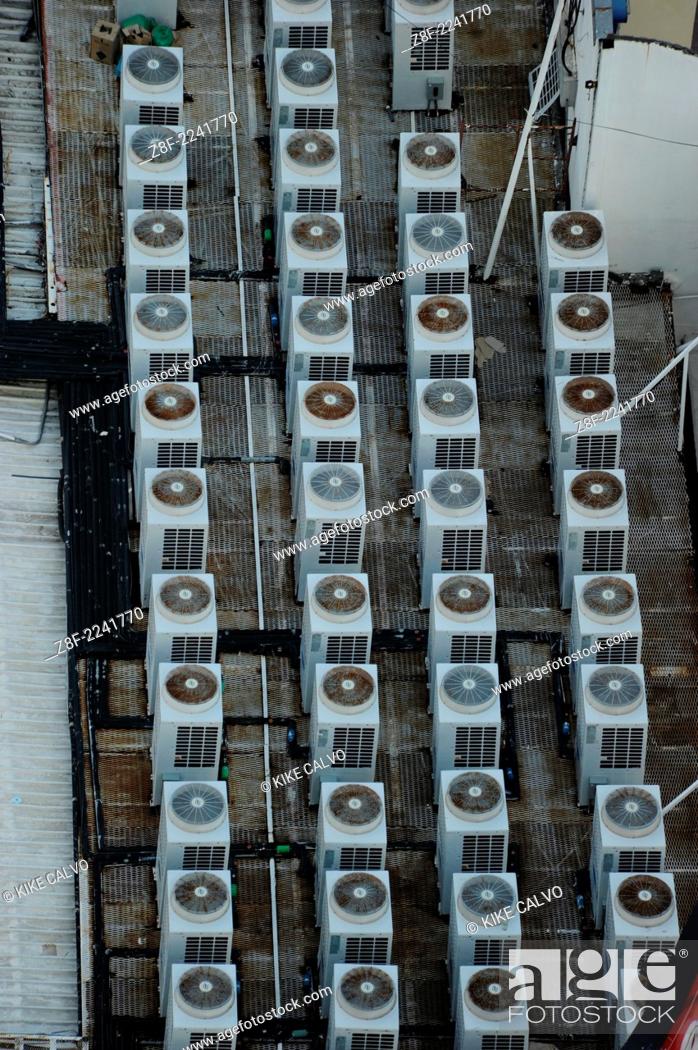 Stock Photo: Foreign investors fuel Panama construction boom: Panama City is a hotbead for construction activity.Pictured: Air conditioning systems on a roof top.