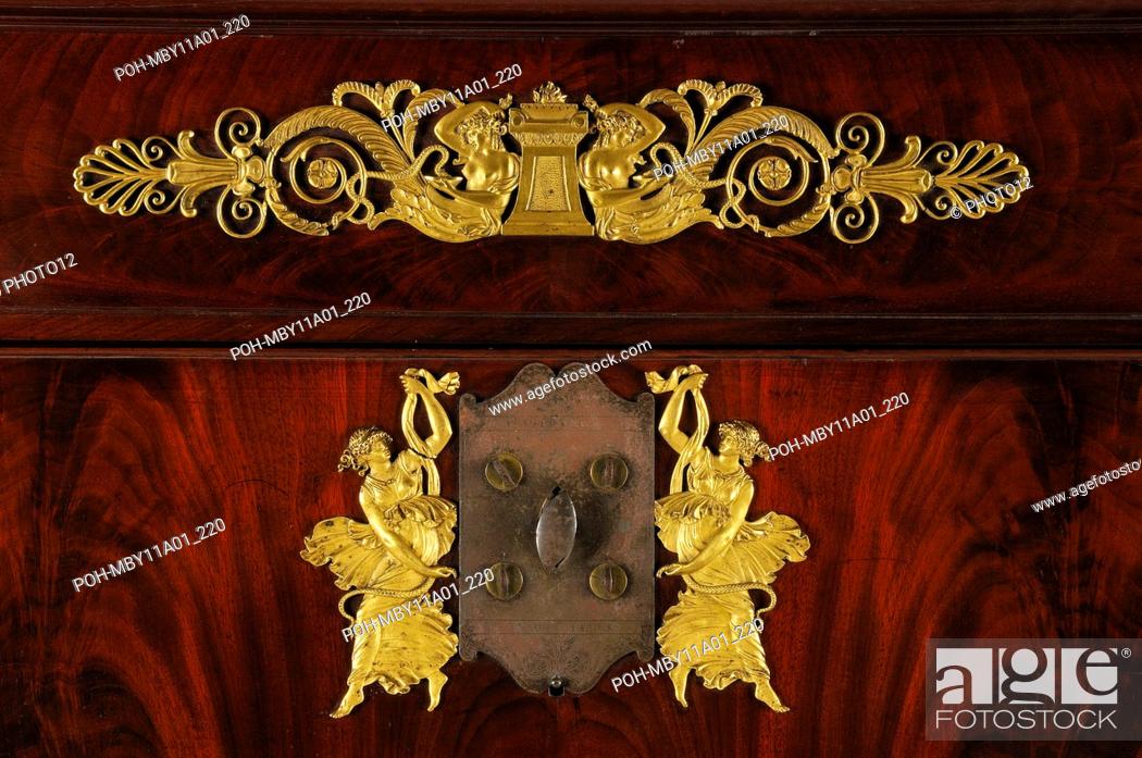 Stock Photo: Detail from a large writing desk containing a safe In mahogany and flamed mahogany veneering Height: 157 cm, length: 105 cm.