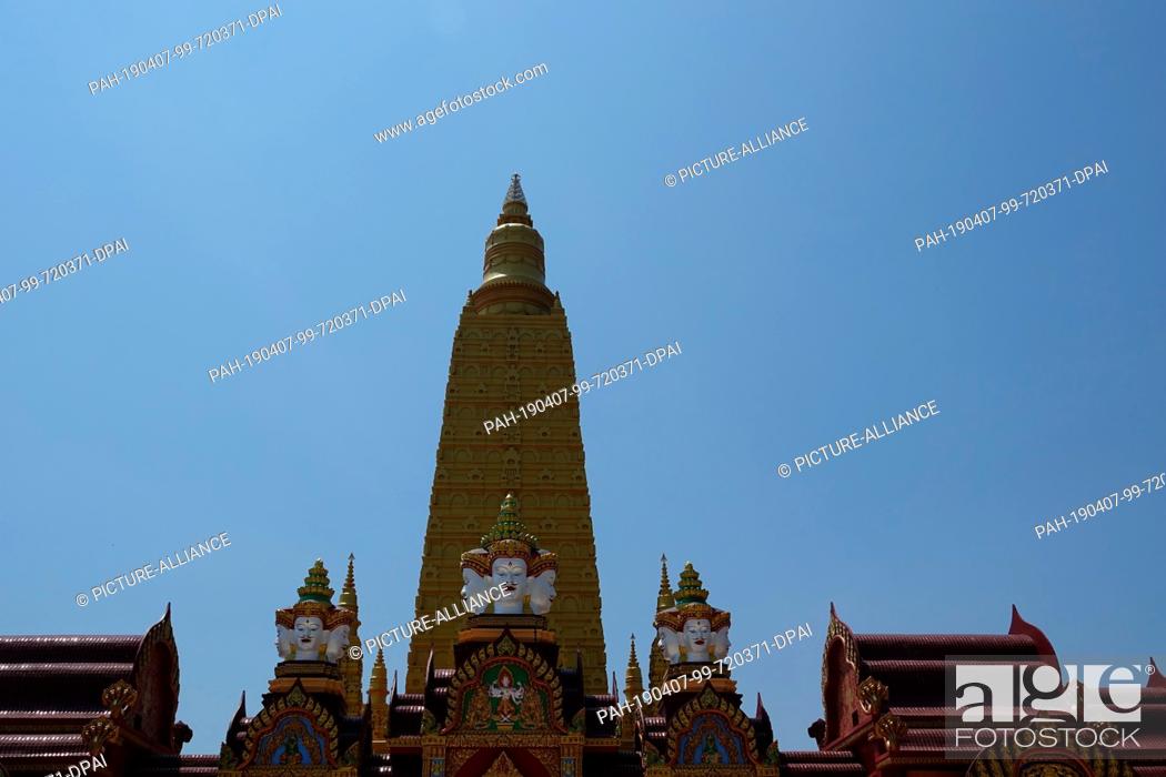 Stock Photo: 04 March 2019, Thailand, Ao Luek Distrikt: The Chedi des Wat Maha That Wachira Mongkol or also called Wat Bang Tong. The Chedi, a tower-like structure.