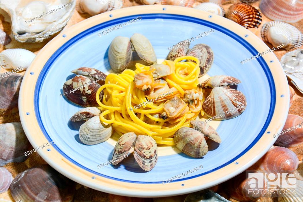 Stock Photo: spaghetti with clams cooked separately and shelled separately and seasoned with spices.