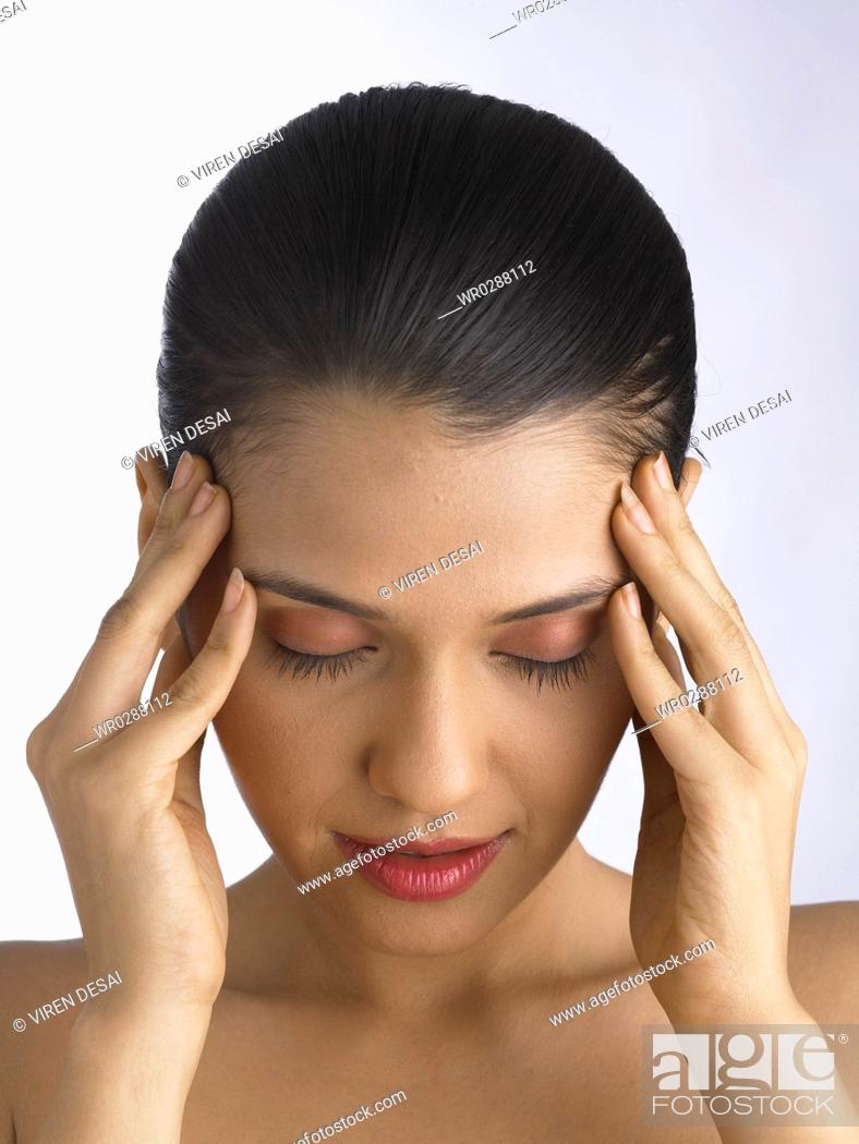 Stock Photo: South Asian Indian woman pacifying herself MR 702.