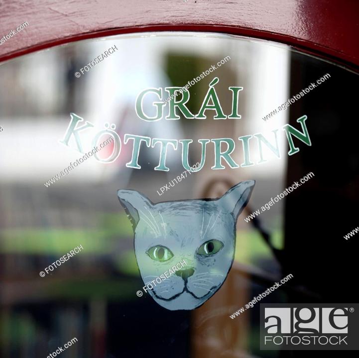 Stock Photo: Signage painted on window with illustrations of a grey cat.