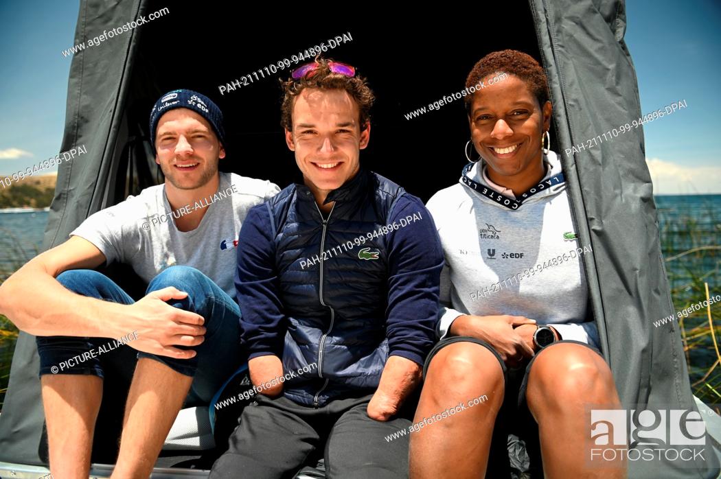 Stock Photo: 09 November 2021, Bolivia, Copacabana: Matthieu Witvoet (l-r), who defines himself as an ""eco-adventurer"", Theo Curin, Paralympic swimmer, and Malia Metella.
