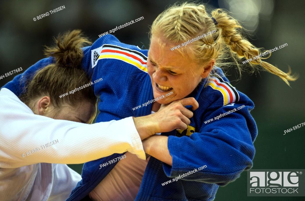 Stock Photo: Germany's Luise Malzahn (blue) competes in the Women's -78kg Final with Marhinde Verkehr of Netherlands at the Baku 2015 European Games in Heydar Aliyev Arena.