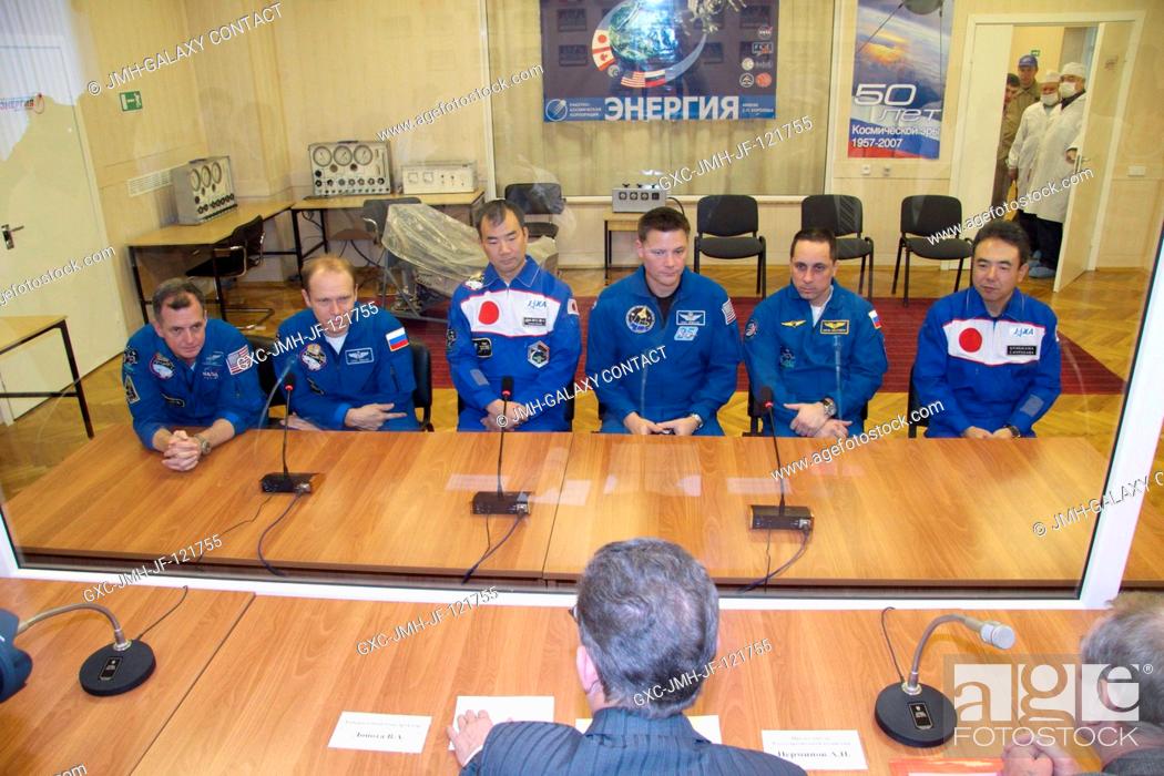 Stock Photo: - At the Baikonur Cosmodrome in Kazakhstan, the prime and backup crews for Expedition 22 meet with Russian space officials in their suit up and integration.