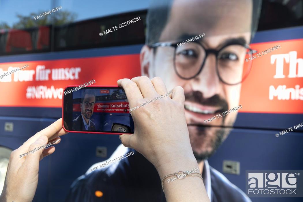 Stock Photo: A journalist photographs the picture of Thomas KUTSCHATY, top candidate of the North Rhine-Westphalia SPD and chairman of the SPD state parliamentary group.