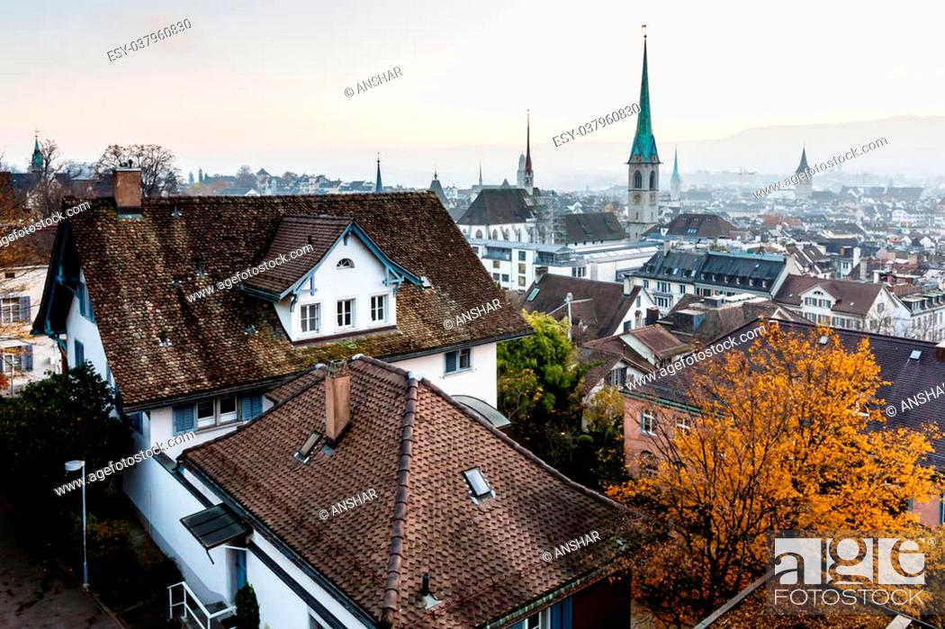 Stock Photo: Aerial View on Tiled Roofs and Churches of Zurich at Fall, Switzerland.
