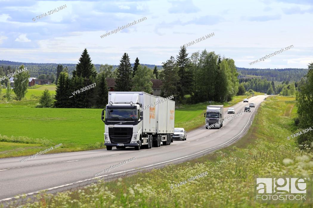 Stock Photo: Road landscape of Highway 9 on a day of summer with truck and car traffic. Jamsa, Finland - June 14, 2018.