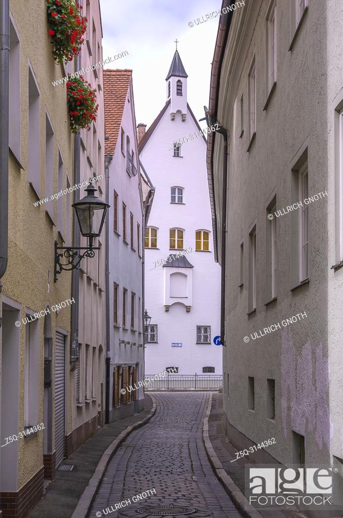 Stock Photo: Augsburg, Bavaria, Germany - View through the narrow lane of Schleifergässchen to the monastery of the Franciscan nuns of the Star of Mary.