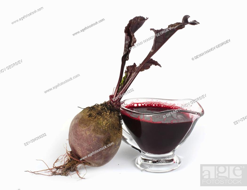 Stock Photo: Red beets with leaves and jug with juice white isolated.