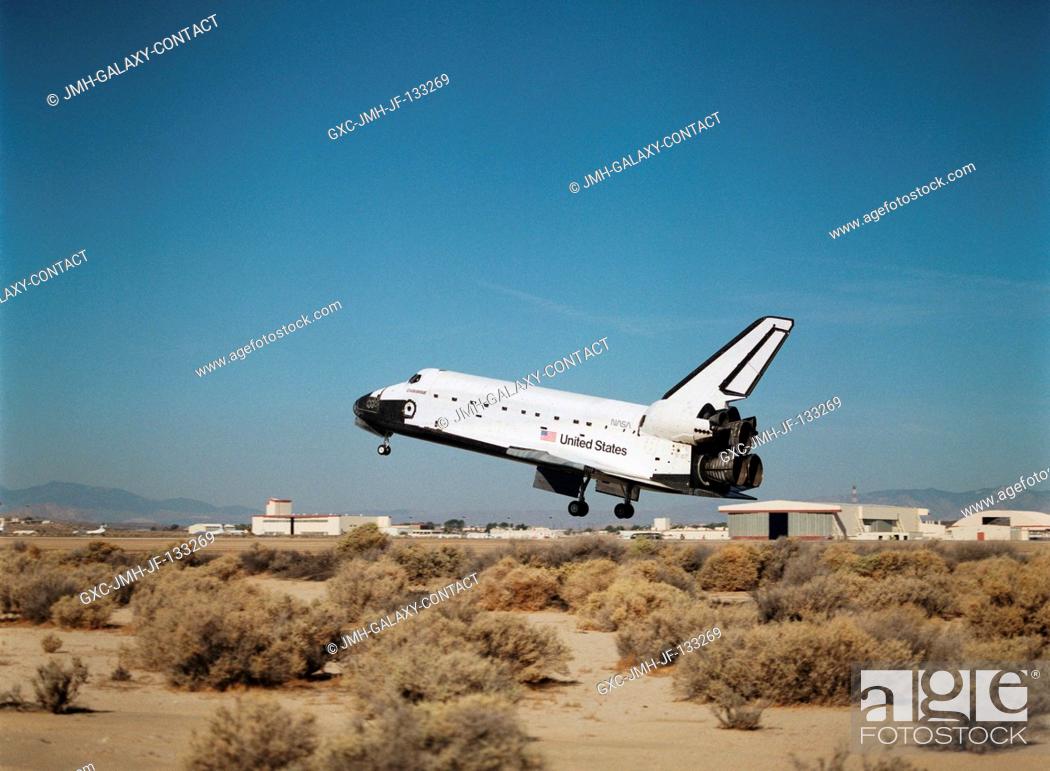 Stock Photo: With its main landing gear not quite on the runway, the Space Shuttle Endeavour wraps up an eleven-day mission at Edwards Air Force Base, California.