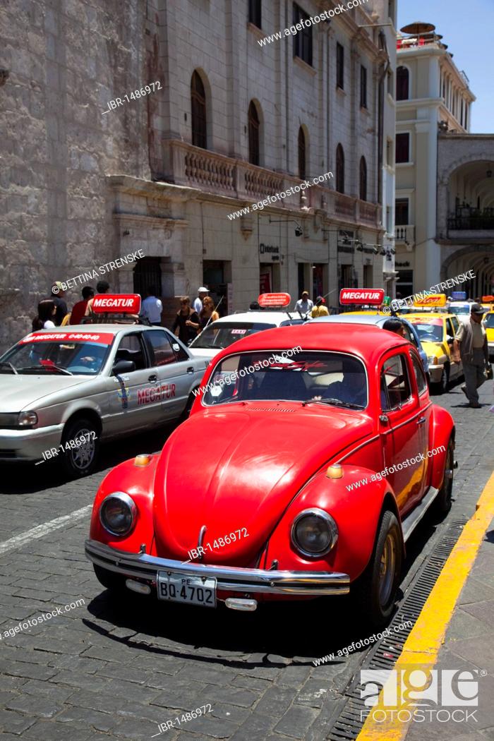 Stock Photo: Red vintage Volkswagen Beetle on the streets of Arequipa, Peru, South America.