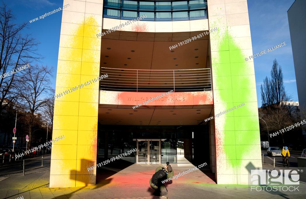 Stock Photo: 09 December 2019, Berlin: Colourful paint can be seen in the morning at the entrance of the Willy Brandt House, the SPD headquarters.
