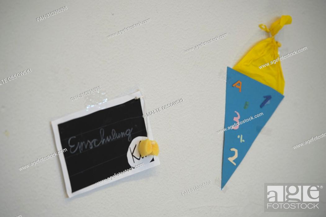 Stock Photo: School bag and board with the word SCHOOLING made of paper sticking to a wall, feature, edge motif, symbolic photo Dorothee FELLER, CDU.