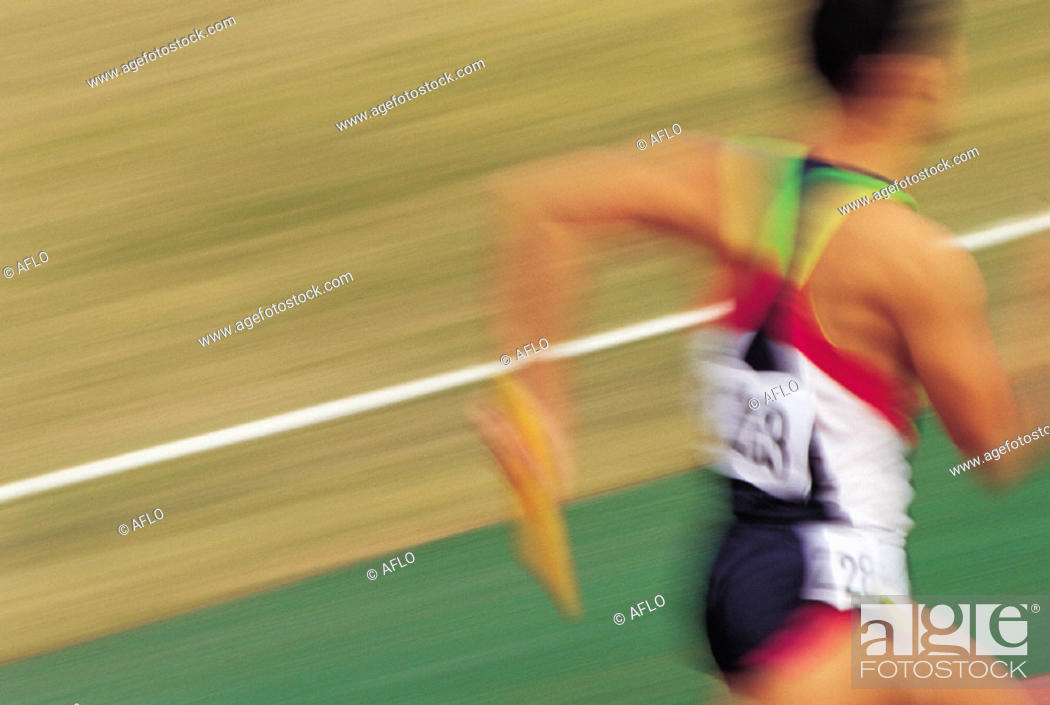 Stock Photo: Close-Up, Color Image, Man, Only, One, Outdoors, Sport, Motion, Young, Horizontal, Running, Body, Teenager, Speed, Field, Track, Competitive, Action, Professional, Day, Athletics, Event, Japanese, Upper, 20'S, Relay-Race, Relay-Baton, Asian Ethnicity, Blurred Motion, People