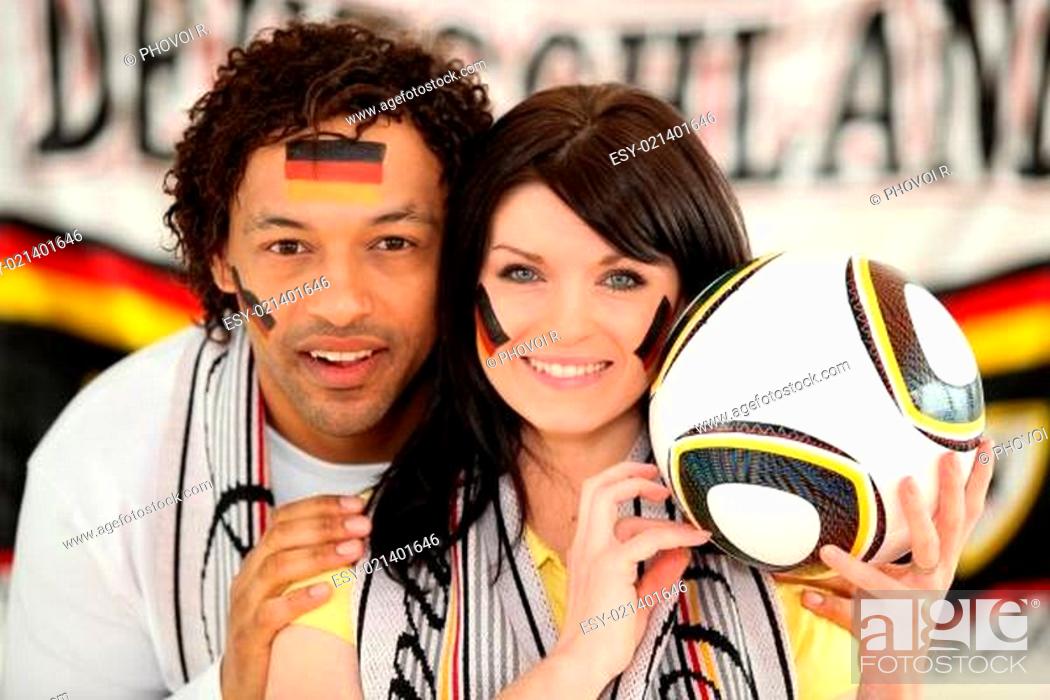 Stock Photo: Couple supporting the German football team.