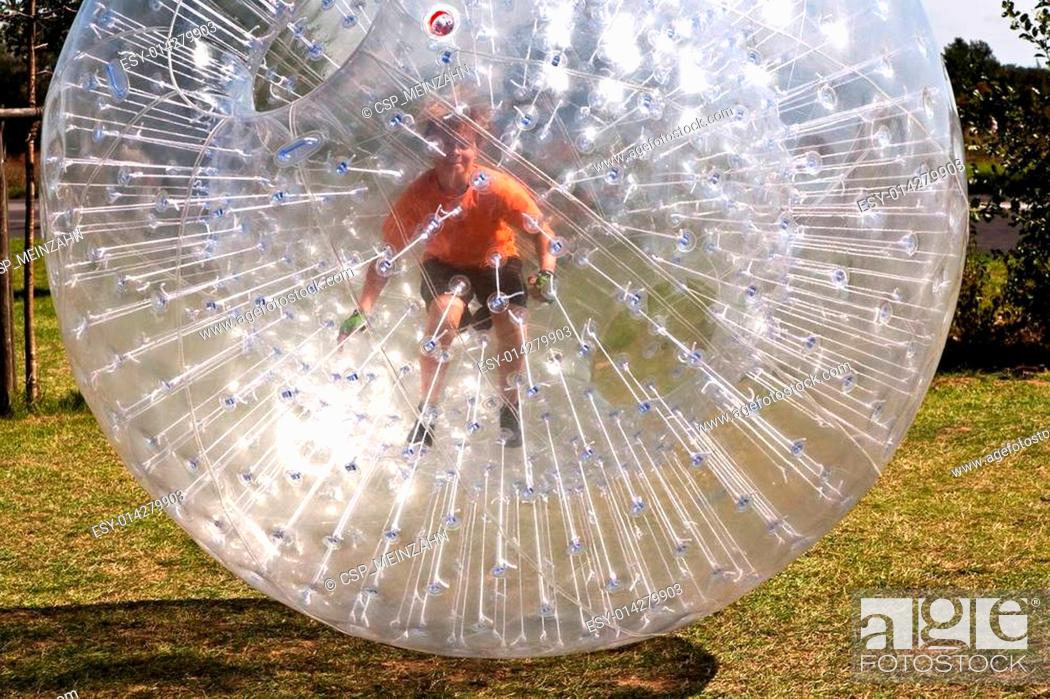 Stock Photo: child has a lot of fun in the Zorbing Ball.