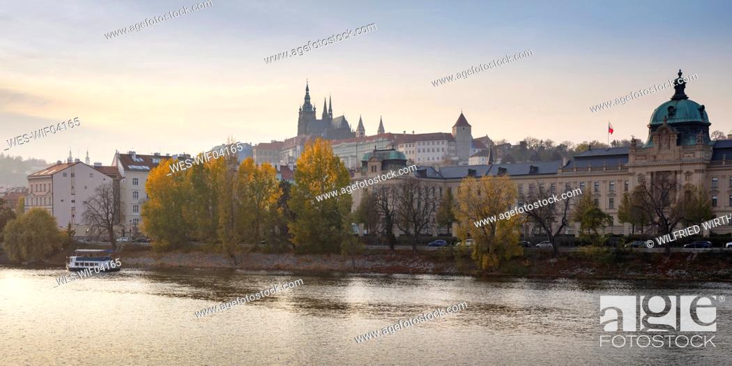 Stock Photo: Czech Republic, Prague, Prague Castle and St. Vitus Cathedral seen across river.