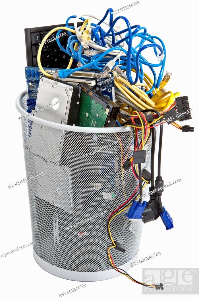 Stock Photo: electronic scrap in trash can.