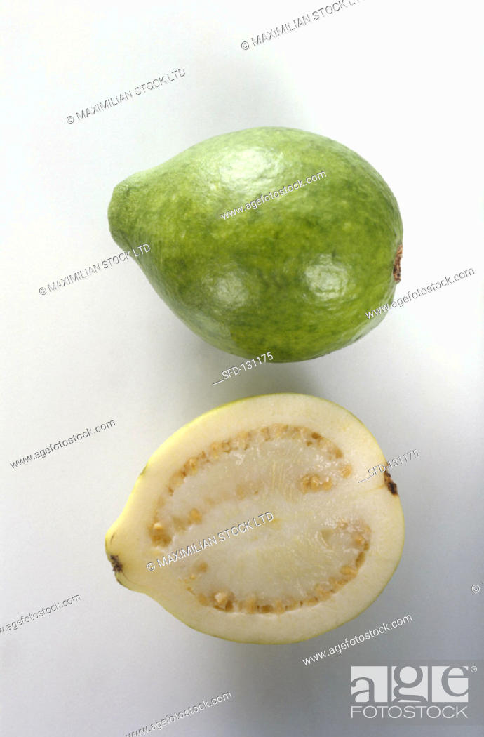 Stock Photo: Whole and half guava.
