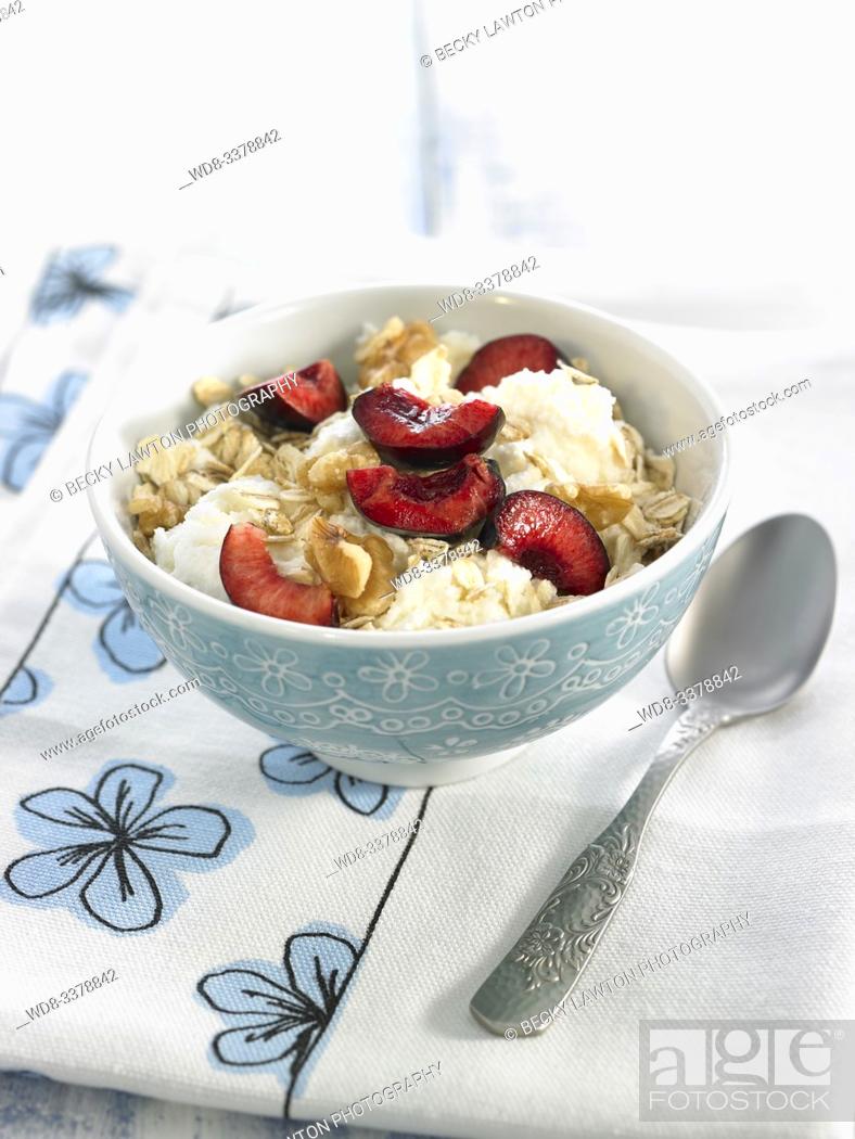 Stock Photo: requeson con copos y cerezas / curd with flakes and cherries.