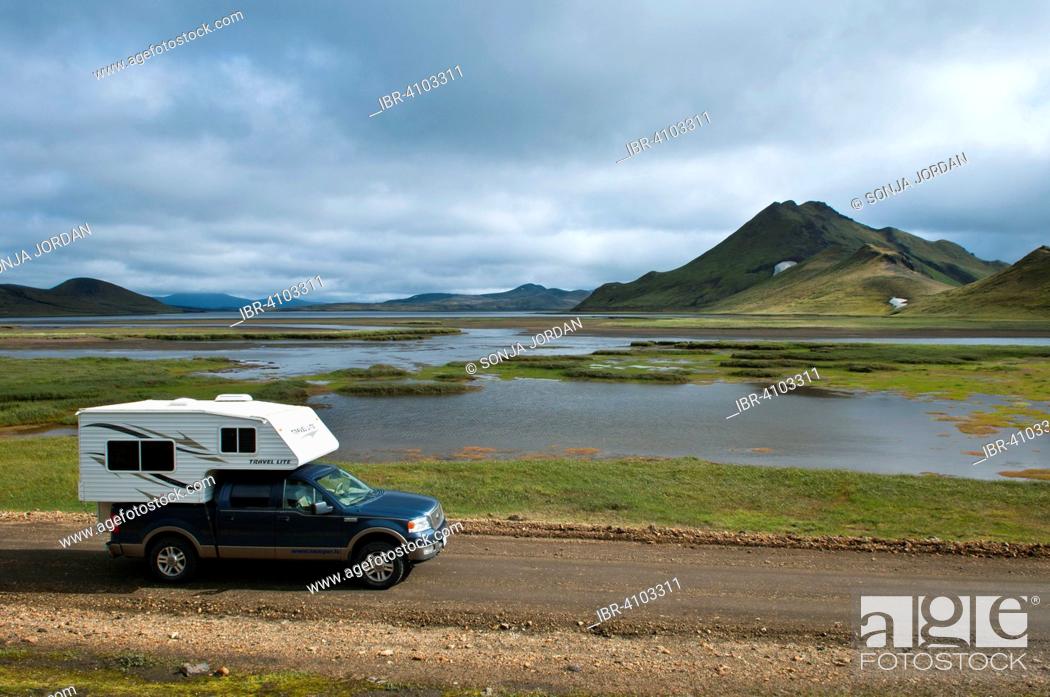 Stock Photo: Camping car, pickup truck with camper, Icelandic landscape, Highlands, Landmannalaugar, Iceland.