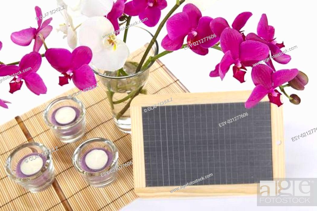 Stock Photo: Bouquet of orchids with slate.