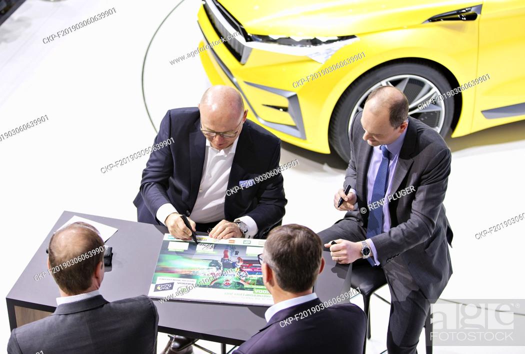 Stock Photo: Skoda Auto CEO Bernhard Maier (left) signed a sponsorship contract with Tour de France organiser A.S.O. up to 2023 during the 2019 Geneva International Motor.