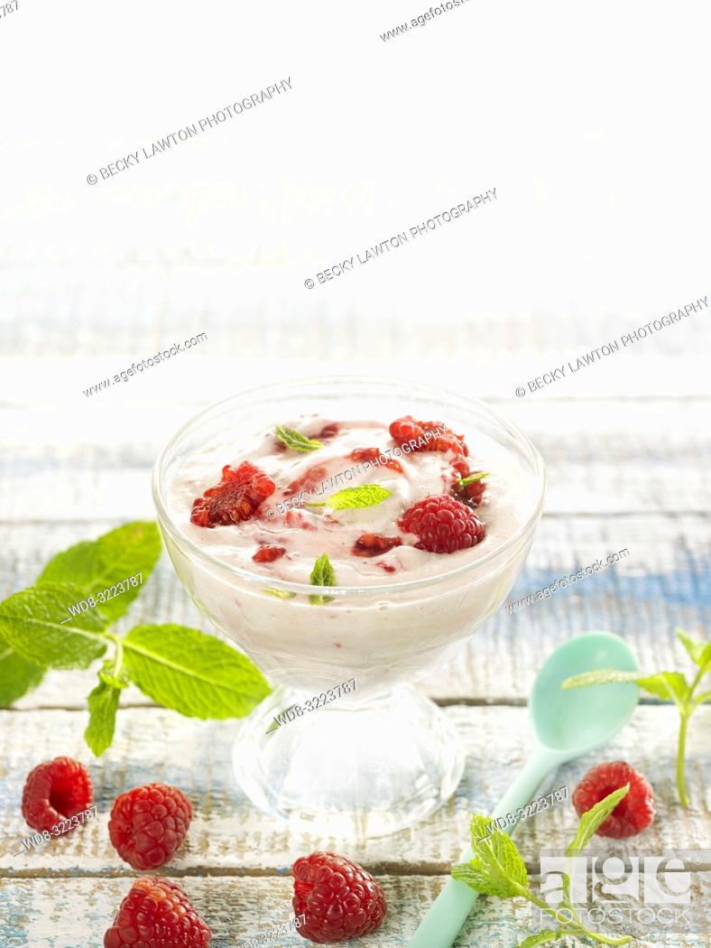 Stock Photo: mousse de platano con frambuesas / banana mousse with raspberries.