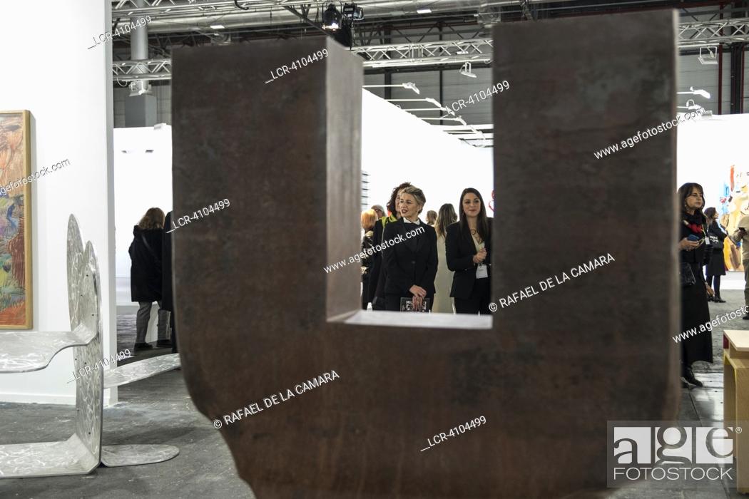 Stock Photo: YOLANDA DIAZ SECOND VICE PRESIDENT OF THE GOVERNMENT OF SPAIN WITH UNTITLED SCULPTURE IN CORTEN STEEL BY EDUARDO CHILLIDA (1924-2002) IS THE MOST EXPENSIVE WORK.