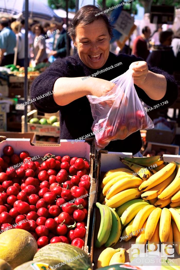 Stock Photo: Gallego fruit vendor at the Friday Market, Cangas, Galicia, Spain, Europe.