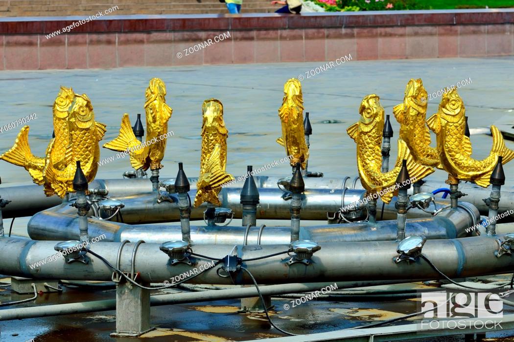Stock Photo: Moscow, Russia - august 12, 2019: The Peoples Friendship, Friendship of Nations, fountain with golden statues at VDNKh in Moscow.
