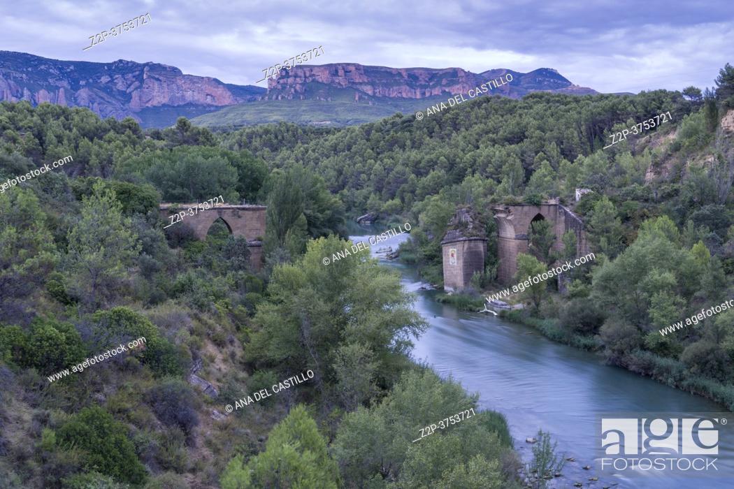 Stock Photo: Destroyed Bridge over the River Gallego in the Murillo de Gallego Huesca Aragon Spain on August 18, 2020.