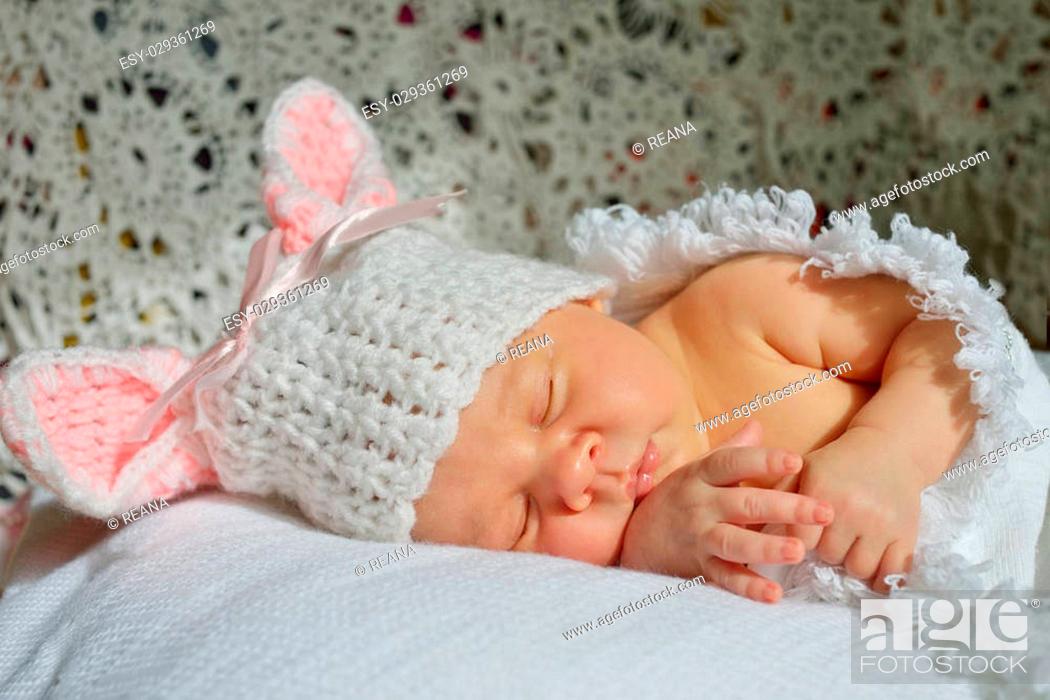 Stock Photo: sweet little newborn sleeping on the sun.