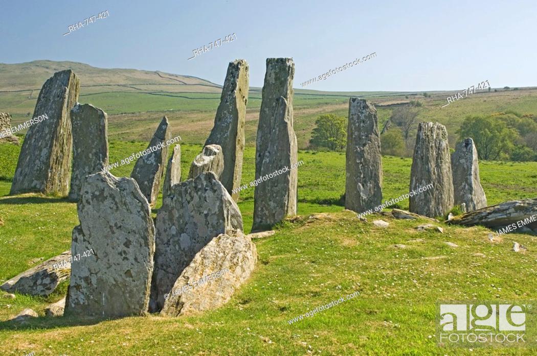 Stock Photo: Chambered cairn dating from 2000 BC at Cairnholy near Creetown, the opened burial chamber is in the foreground with the Sentinel Stones behind.