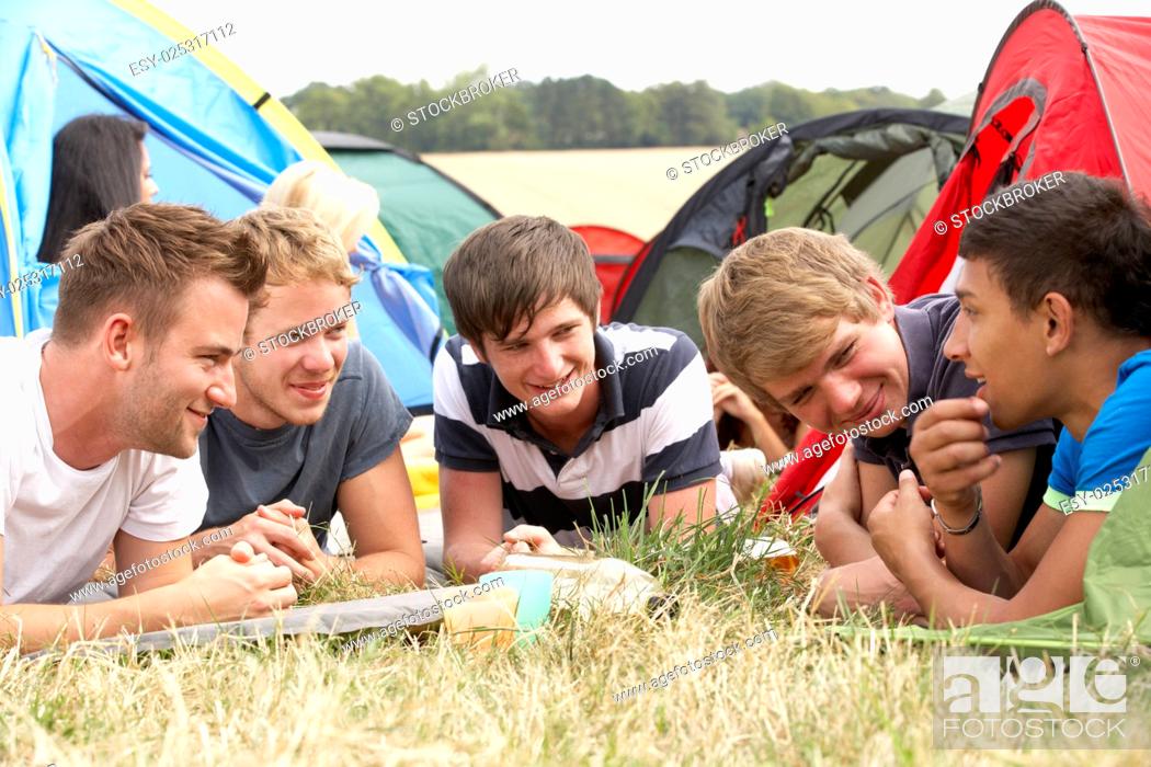 Stock Photo: Young people on camping trip.
