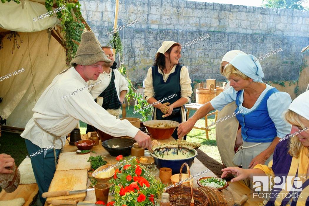 Stock Photo: Peasants preparing a meal during a medieval festival, Burghausen, Upper Bavaria, Bavaria, Germany, Europe.
