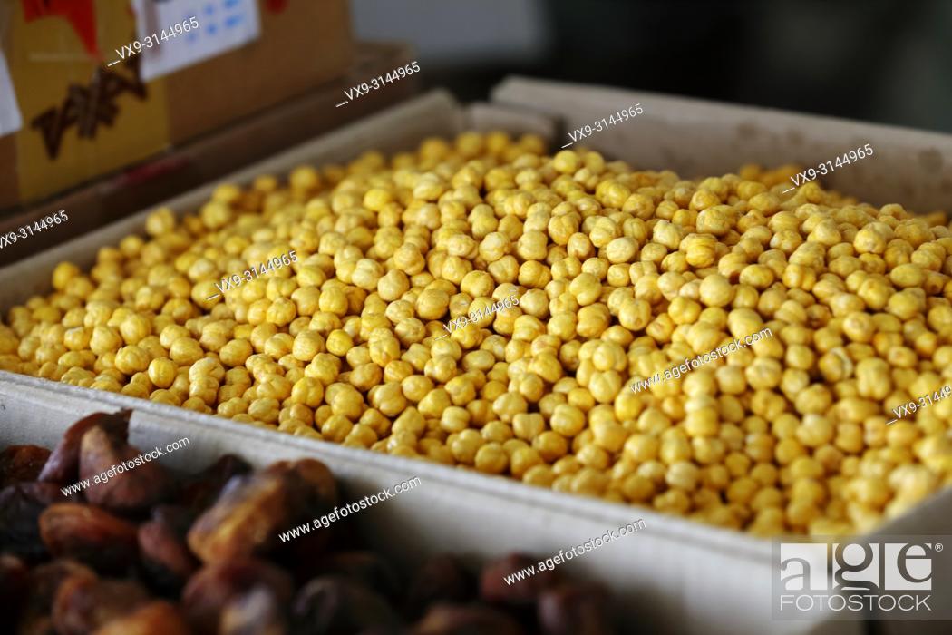 Stock Photo: Close-up shot of a pile of chick peas.