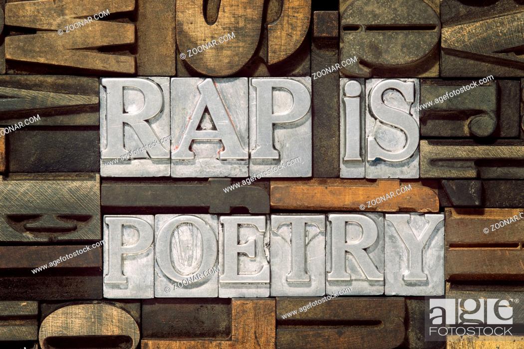 Stock Photo: rap is poetry phrase made from metallic letterpress blocks in mixed wooden letters.