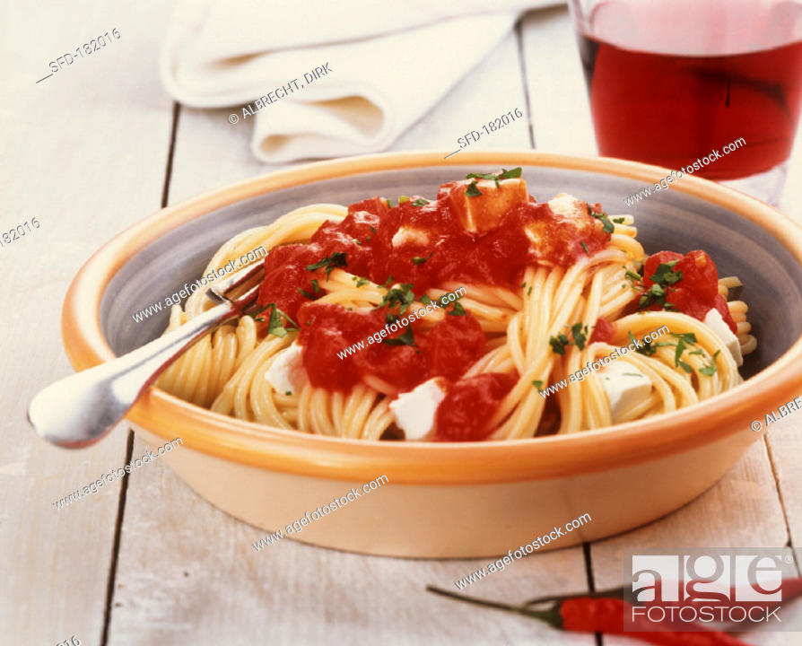 Stock Photo: Spaghetti with spicy tomato sauce and ricotta.